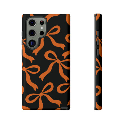 Bold Black and Burnt Orange Bow Pattern Phone Case - Black Phone Case - Samsung Galaxy S23 Ultra / Glossy