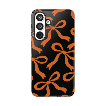 Bold Black and Burnt Orange Bow Pattern Phone Case - Black Phone Case - Samsung Galaxy S26 Plus / Glossy