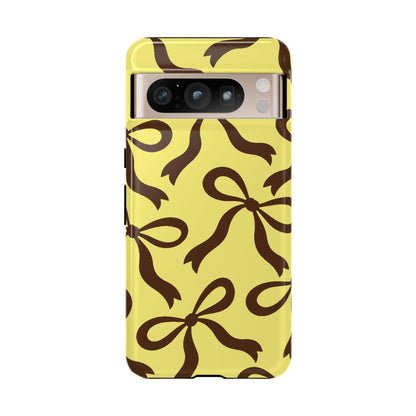 Bold Butter Yellow and Chocolate Brown Bow Pattern Phone Case - Yellow Phone Case - Google Pixel 8 Pro / Glossy