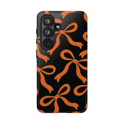 Bold Black and Burnt Orange Bow Pattern Phone Case - Black Phone Case - Samsung Galaxy S26 / Glossy