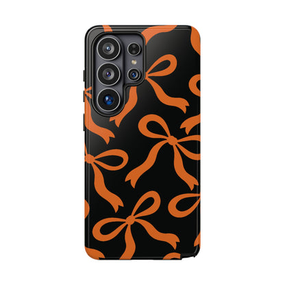Bold Black and Burnt Orange Bow Pattern Phone Case - Black Phone Case - Samsung Galaxy S26 Ultra / Glossy