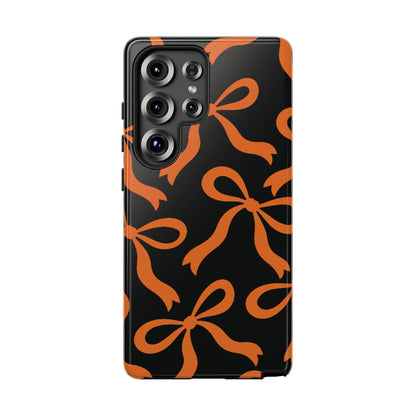 Bold Black and Burnt Orange Bow Pattern Phone Case - Black Phone Case - Samsung Galaxy S25 Ultra / Glossy