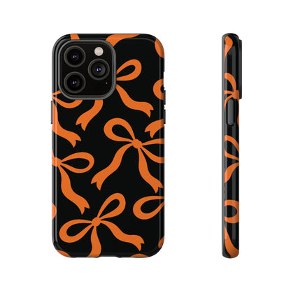 Bold Black and Burnt Orange Bow Pattern Phone Case - Black Phone Case - iPhone 14 Pro Max / Glossy
