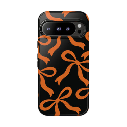 Bold Black and Burnt Orange Bow Pattern Phone Case - Black Phone Case - Google Pixel 9 Pro / Glossy