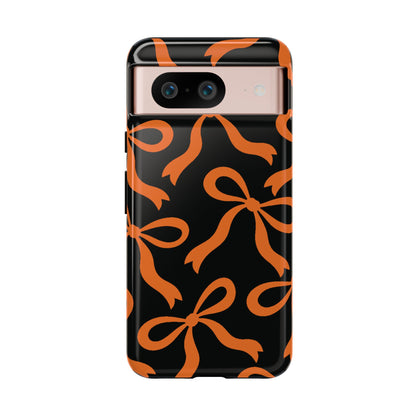 Bold Black and Burnt Orange Bow Pattern Phone Case - Black Phone Case - Google Pixel 8 / Glossy