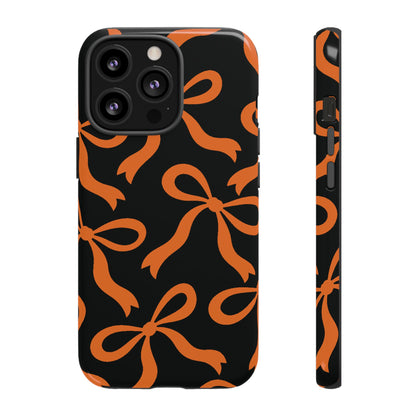 Bold Black and Burnt Orange Bow Pattern Phone Case - Black Phone Case - iPhone 13 Pro / Glossy