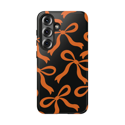 Bold Black and Burnt Orange Bow Pattern Phone Case - Black Phone Case - Samsung Galaxy S25 / Glossy