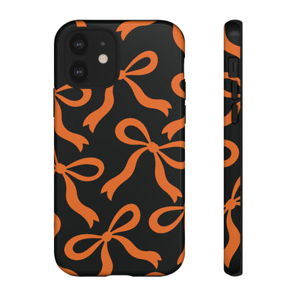 Bold Black and Burnt Orange Bow Pattern Phone Case - Black Phone Case - iPhone 12 / Glossy