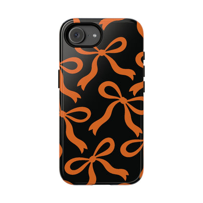 Bold Black and Burnt Orange Bow Pattern Phone Case - Black Phone Case - iPhone 17e / Glossy