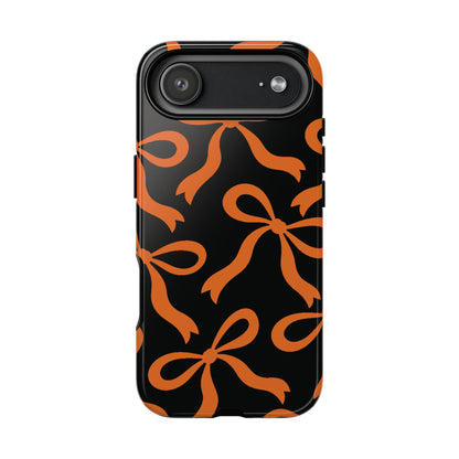 Bold Black and Burnt Orange Bow Pattern Phone Case - Black Phone Case - iPhone 17 Air / Glossy