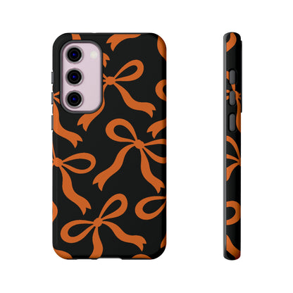 Bold Black and Burnt Orange Bow Pattern Phone Case - Black Phone Case - Samsung Galaxy S23 Plus / Glossy