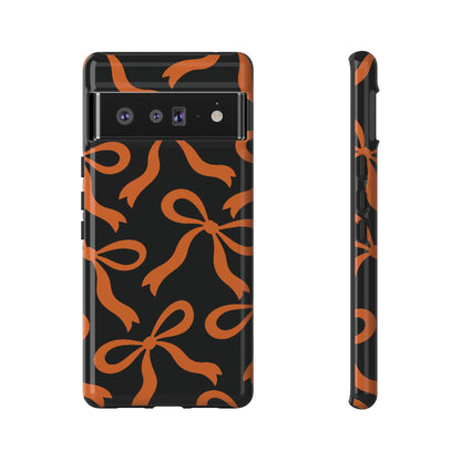 Bold Black and Burnt Orange Bow Pattern Phone Case - Black Phone Case - Google Pixel 6 Pro / Glossy