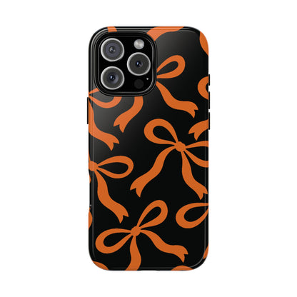 Bold Black and Burnt Orange Bow Pattern Phone Case - Black Phone Case - iPhone 16 Pro Max / Glossy