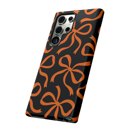Bold Black and Burnt Orange Bow Pattern Phone Case