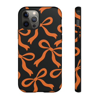 Bold Black and Burnt Orange Bow Pattern Phone Case - Black Phone Case - iPhone 12 Pro / Glossy